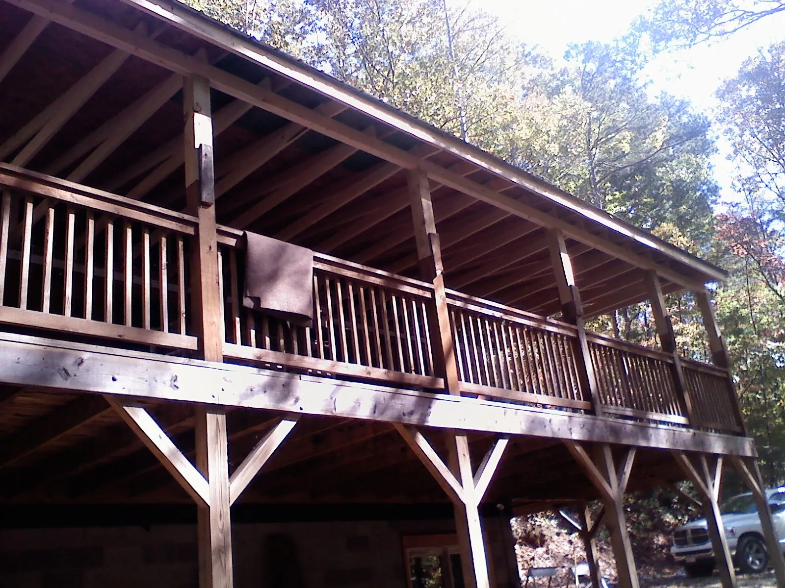 Timber framing under a new elevated porch and deck — Roof Leak Repair in Price by Roofing Brothers